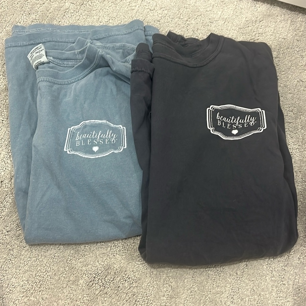 Two beautifully blessed shirts